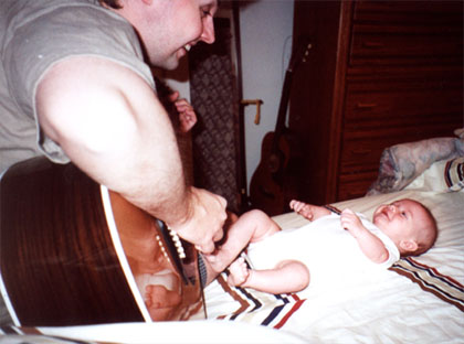 Dad plays his guitar