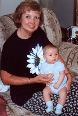 Big boy sitting on Grandma's lap