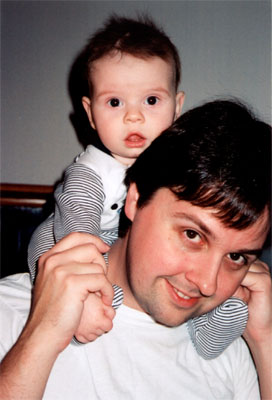 on Daddy's shoulders